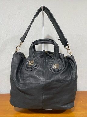 Black Leather Shoulder Bag with Gold Accents